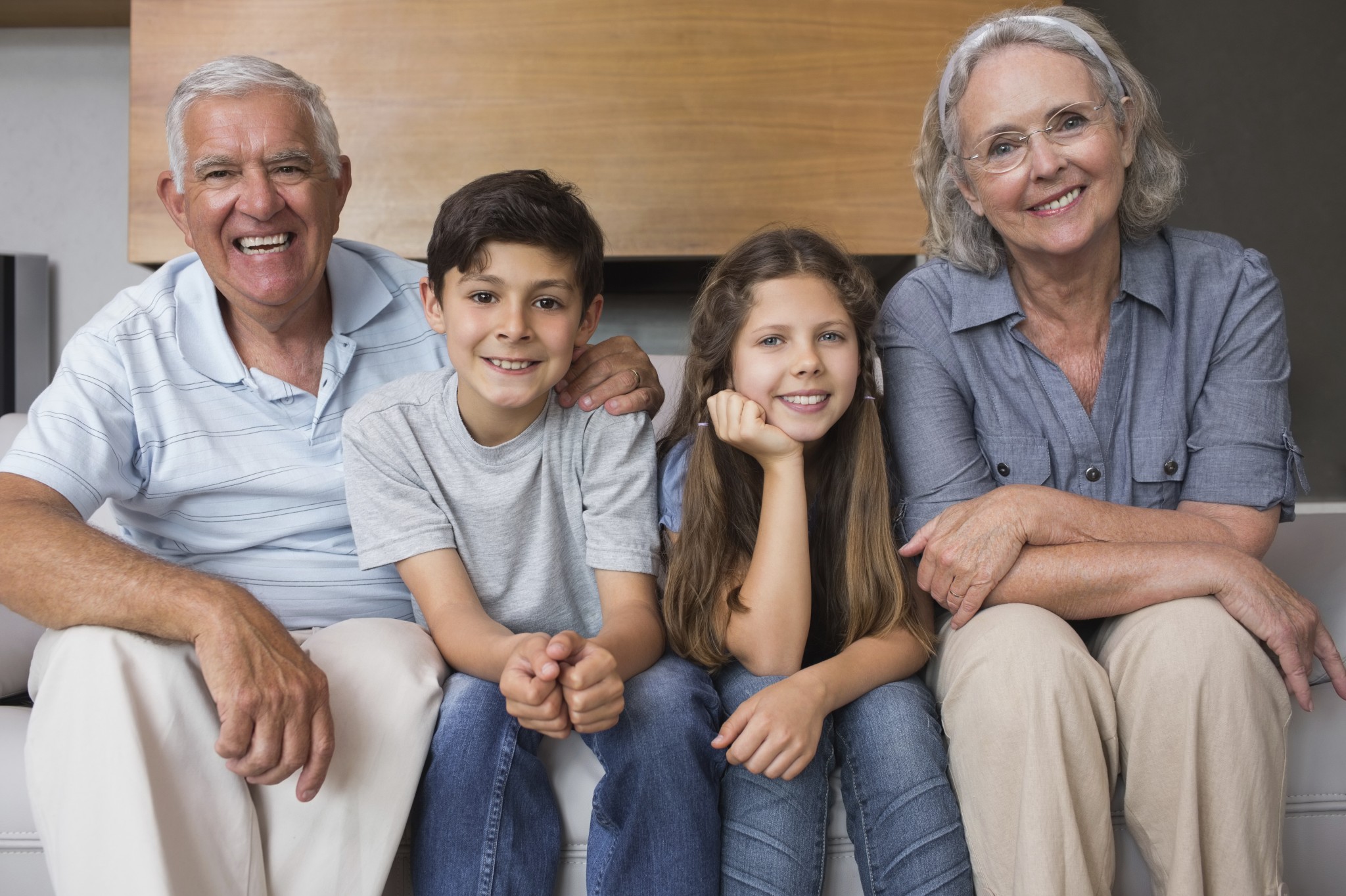 Grandpa is in the bedroom. Grandparents in the Living Room. Family and grandparents photo for Kids. Stock photo of grandparents sitting. Grandparents in the livingroom.