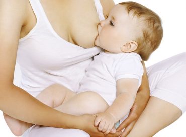Mother feeding breast feeding her baby